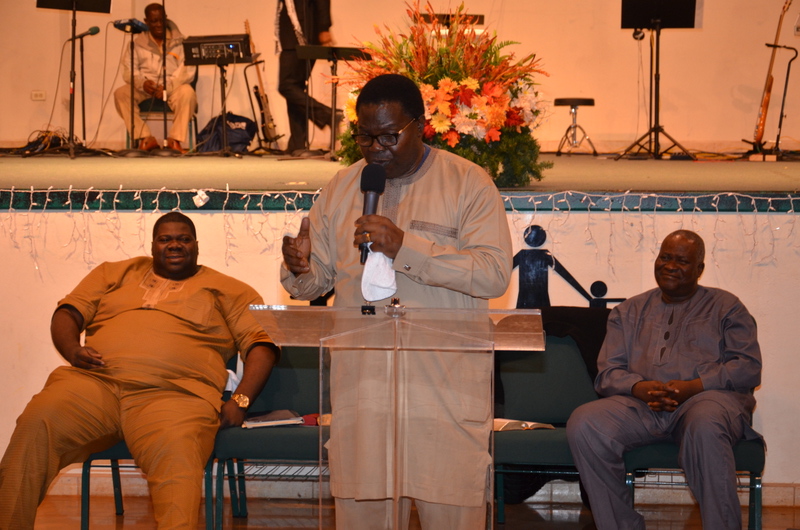 Apostle Odeneye ministering with Baba Ebenezer Obey seated nearby