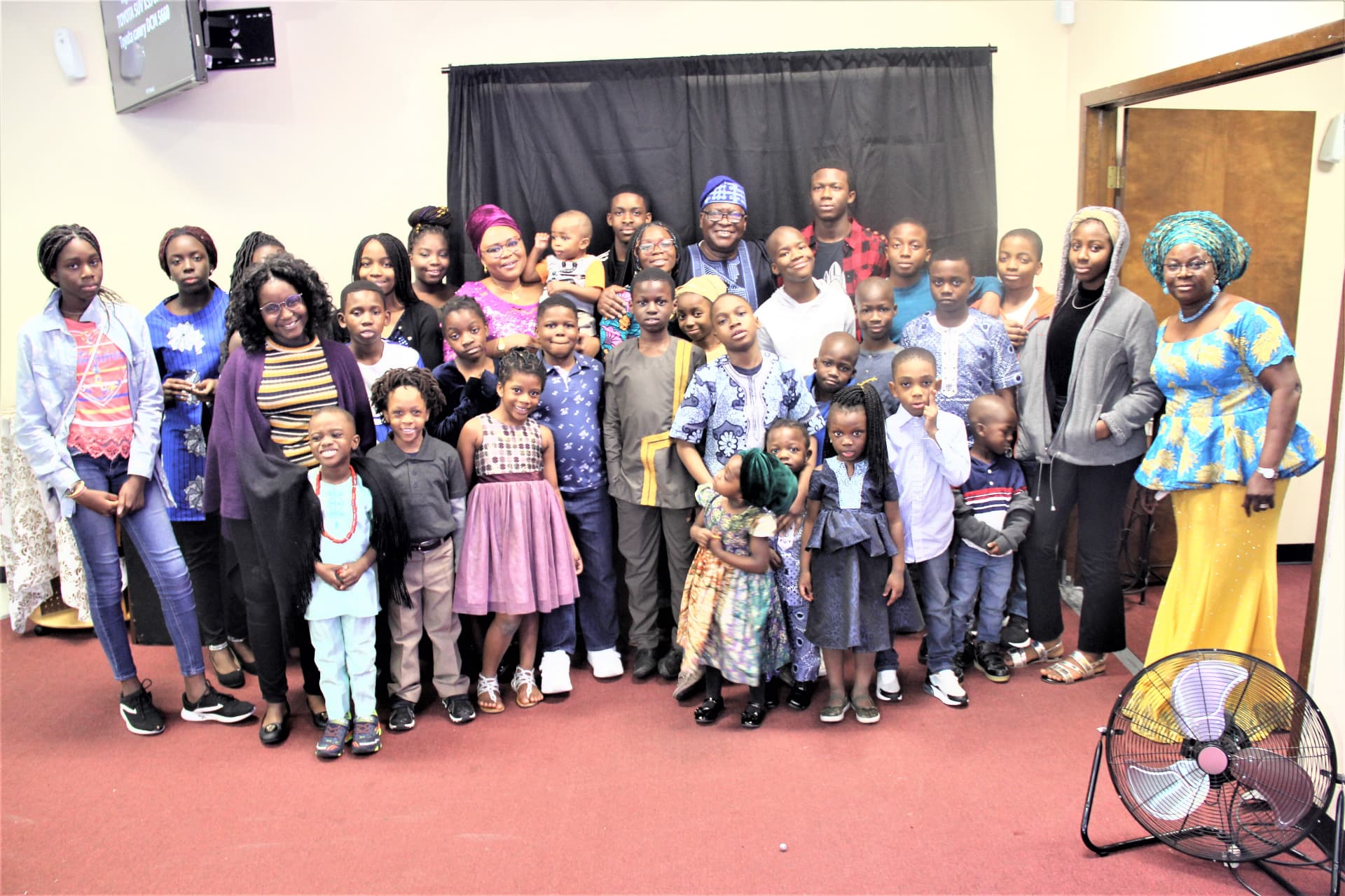 Apostle Odeneye with the children's department